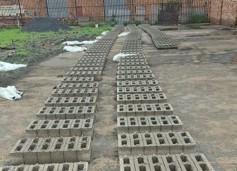Rows of M140 hollow concrete blocks at the Burgersfort block yard